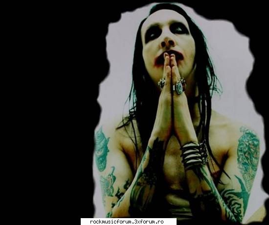 Marilyn Manson... - mie nu-mi prea place qum knta da' nici nu ma - Poze